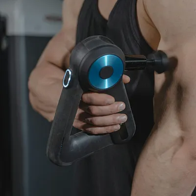 Beste massage gun vergelijking: Theragun vs budget alternatieven